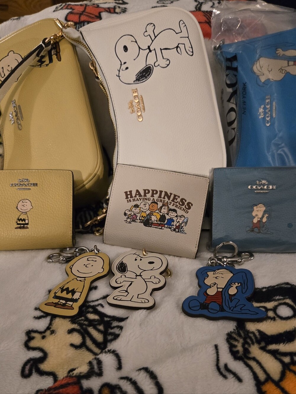 Coach Snoopy Collection Mini Bags & Wallets in White, Yellow, Blue, Cream